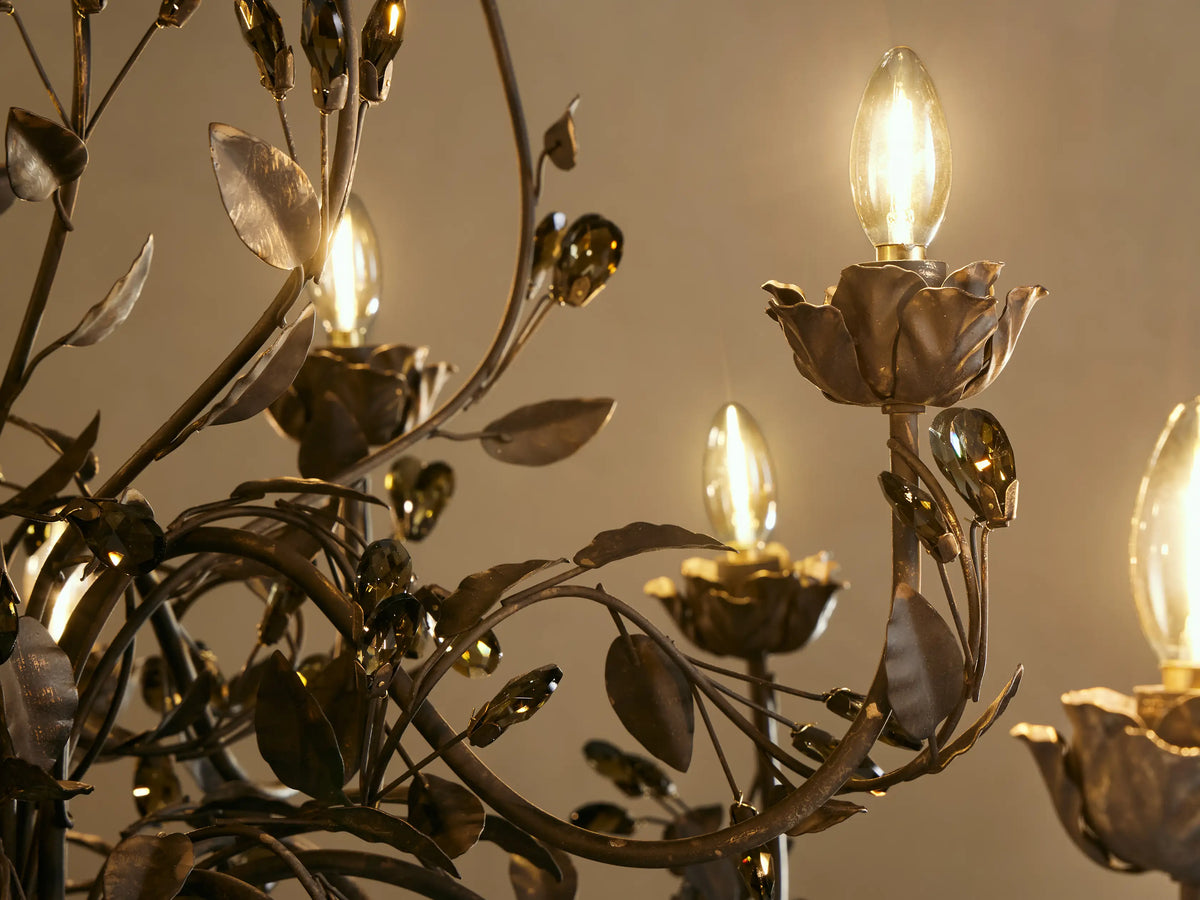 Nicoletta Round Chandelier, dark bronze floral design with leafy branches, smoke-colored crystals, and multiple candle bulbs.