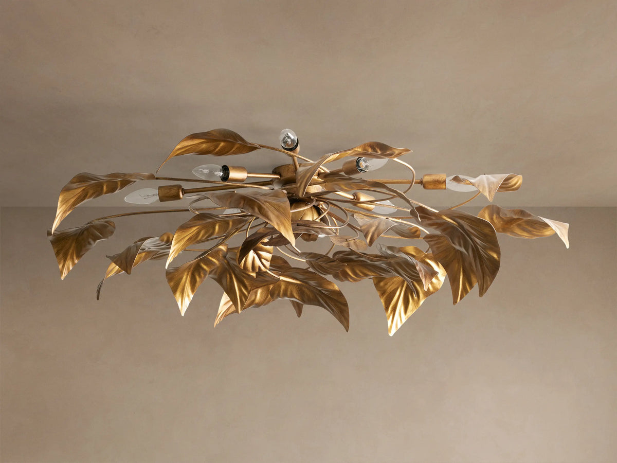 Ninfea Flush Mount: Antiqued gold botanical ceiling light, metallic leaves, multiple candelabra bulbs, mounted overhead.