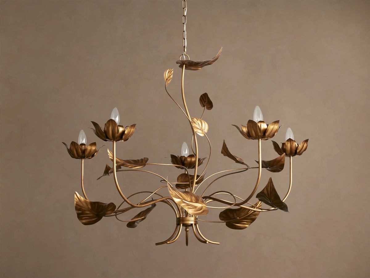 Ninfea Chandelier with antiqued gold finish, featuring delicate metal water lily blossoms and leaves with 6 clear bulbs.