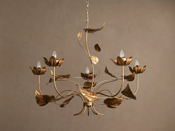 Ninfea Chandelier with antiqued gold finish, featuring delicate metal water lily blossoms and leaves with 6 clear bulbs.