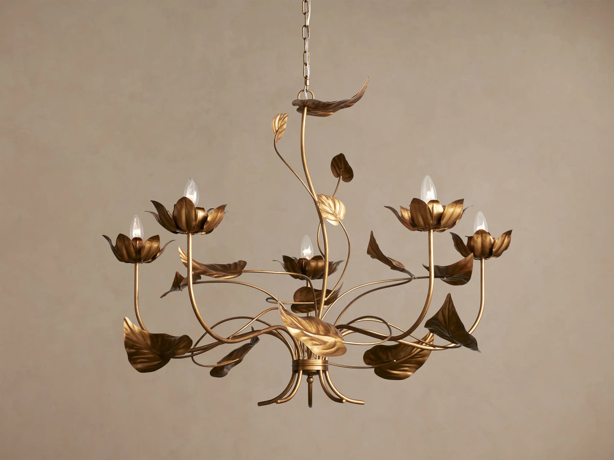 Ninfea Chandelier with antiqued gold finish, featuring delicate metal water lily blossoms and leaves with 6 clear bulbs.